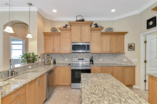 kitchen with light stone countertops, sink, backsplash, pendant lighting, and appliances with stainless steel finishes