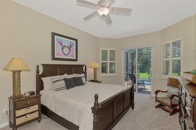 carpeted bedroom with access to exterior and ceiling fan