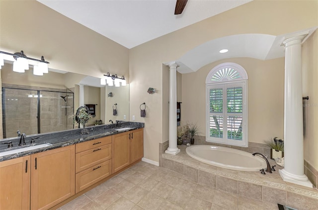 bathroom featuring ornate columns, vanity, ceiling fan, tile patterned flooring, and shower with separate bathtub