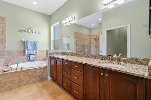 bathroom featuring vanity, separate shower and tub, and tile patterned flooring