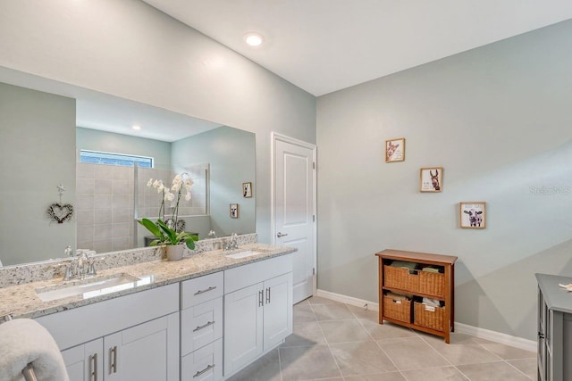 bathroom with vanity and tile patterned floors