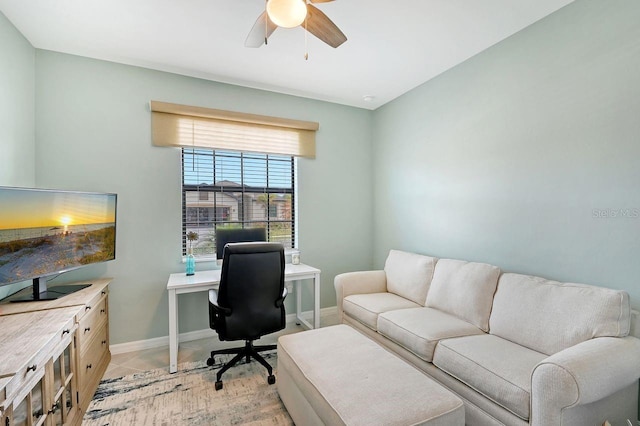 office space featuring ceiling fan and light tile patterned flooring