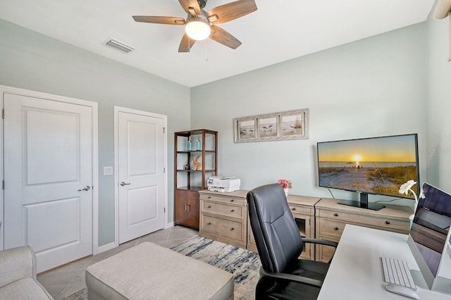 office area featuring ceiling fan and light tile patterned floors