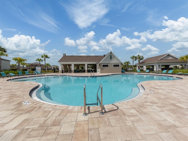 view of pool featuring a patio