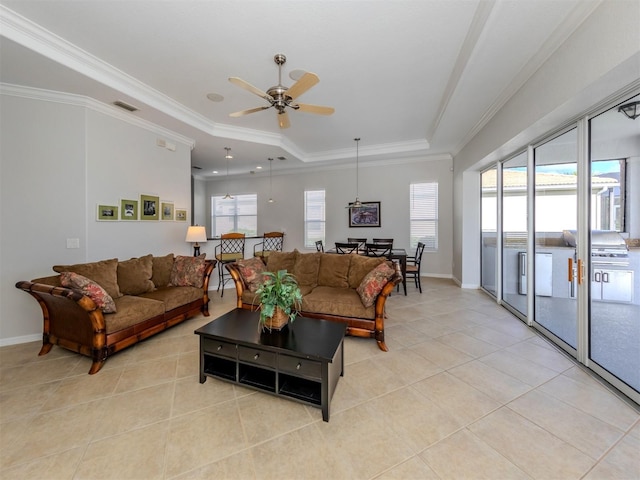 126 Cipriani Way N, Venice, FL 34275 - living area with a raised ceiling, plenty of natural light, visible vents, and light tile patterned floors