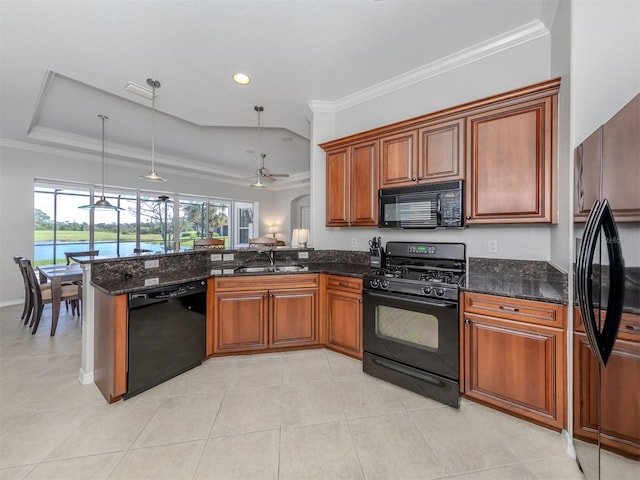 kitchen with ceiling fan, hanging light fixtures, ornamental molding, black appliances, and a water view