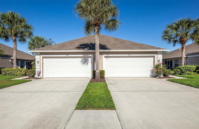 single story home with a garage