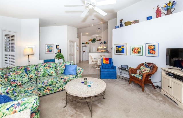living area featuring a ceiling fan, light colored carpet, vaulted ceiling, and recessed lighting