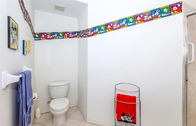 full bathroom featuring toilet, tile patterned floors, baseboards, visible vents, and a stall shower