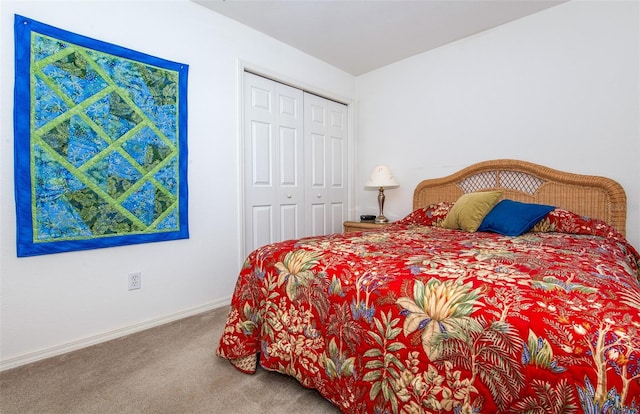 bedroom with a closet and carpet