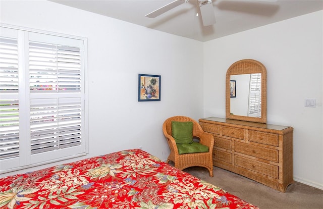 bedroom with ceiling fan and carpet floors