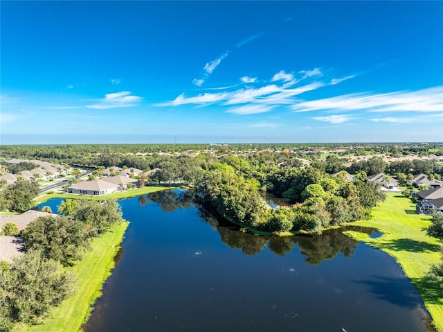 birds eye view of property with a water view and a residential view