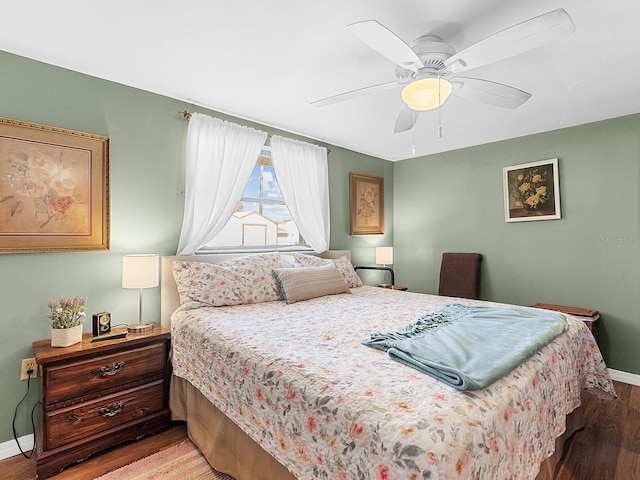 bedroom featuring light hardwood / wood-style floors and ceiling fan