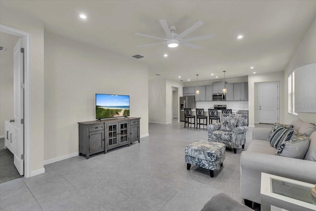 living room with ceiling fan