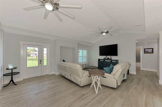 living room with ceiling fan, light hardwood / wood-style floors, and lofted ceiling