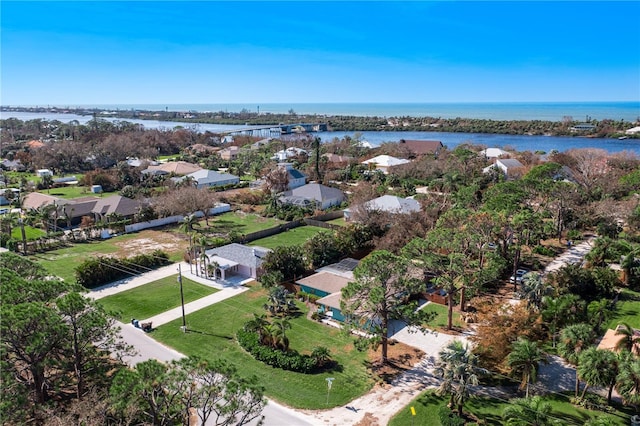 bird's eye view with a water view