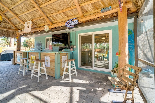 view of patio / terrace with an outdoor bar