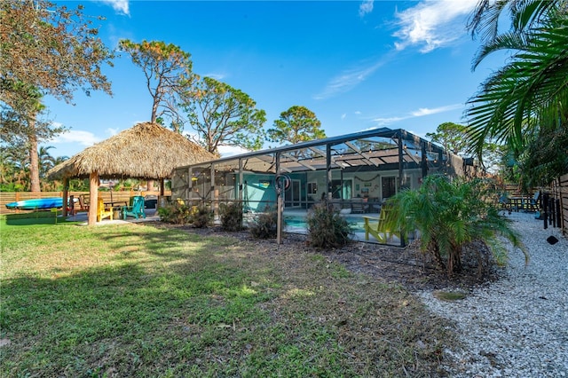 view of yard with a lanai