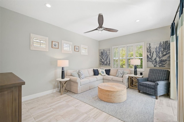 living room with ceiling fan