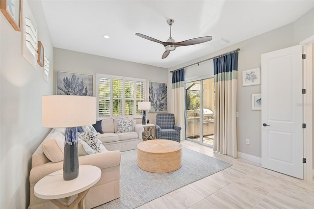 living room with ceiling fan