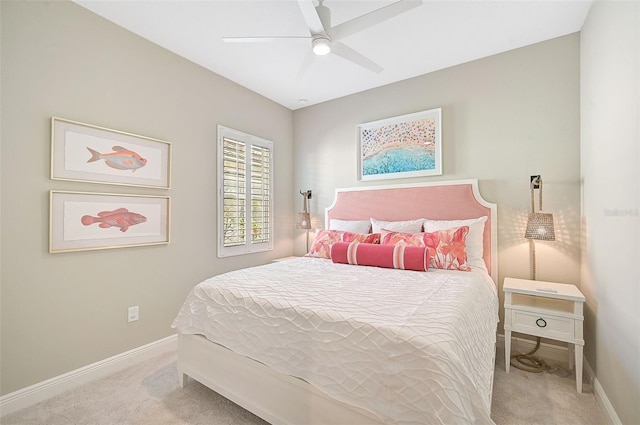 bedroom with ceiling fan and light colored carpet