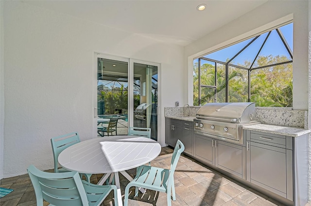 sunroom / solarium with sink