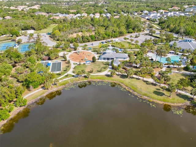 drone / aerial view with a water view