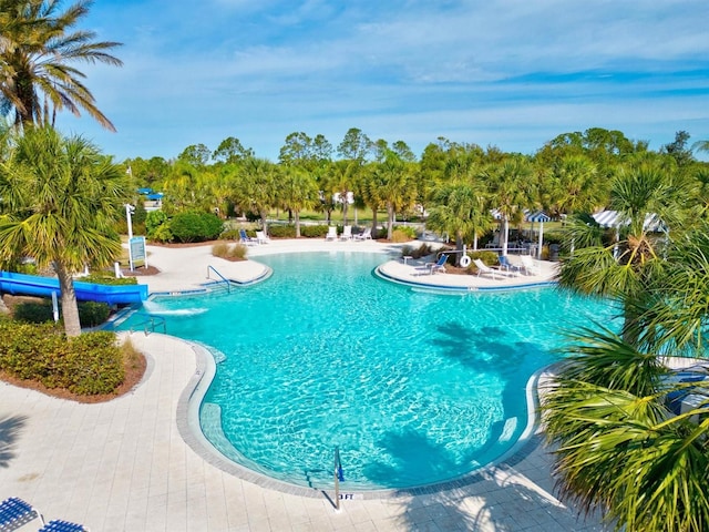 view of swimming pool featuring a patio