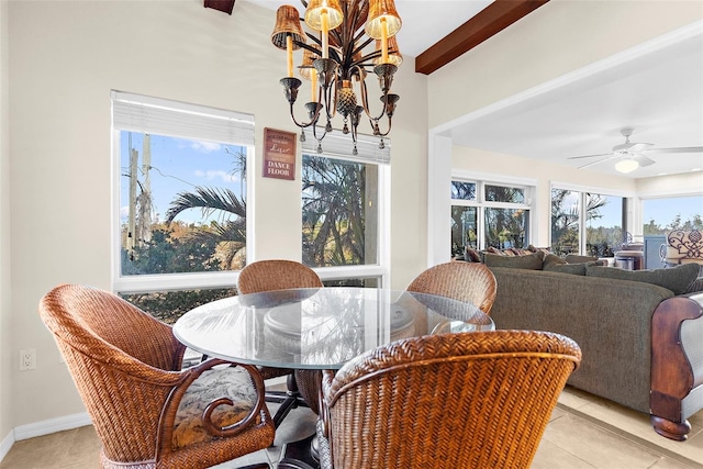 dining room featuring beam ceiling, ceiling fan with notable chandelier, and light tile patterned floors