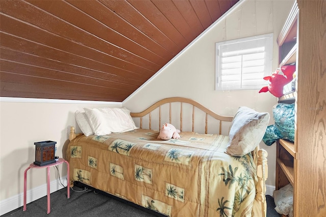 carpeted bedroom featuring crown molding, wooden ceiling, and vaulted ceiling