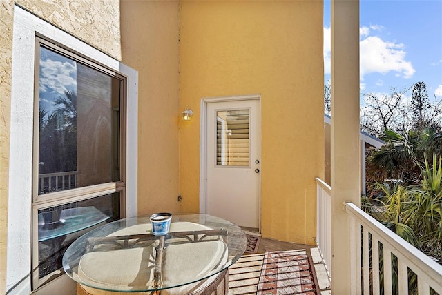 balcony with outdoor dining area