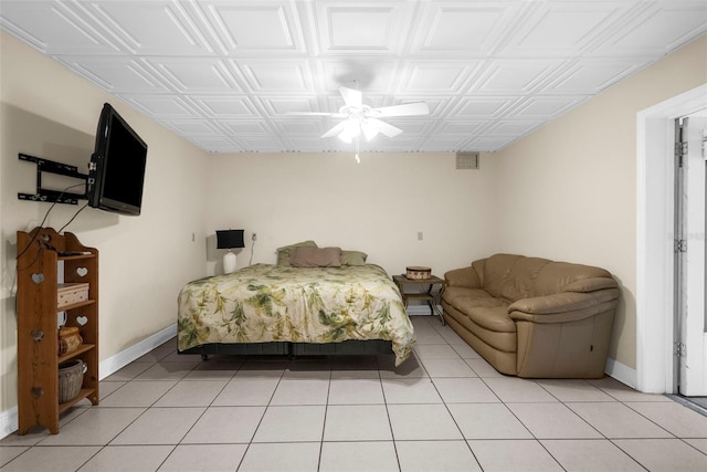 tiled bedroom with ceiling fan