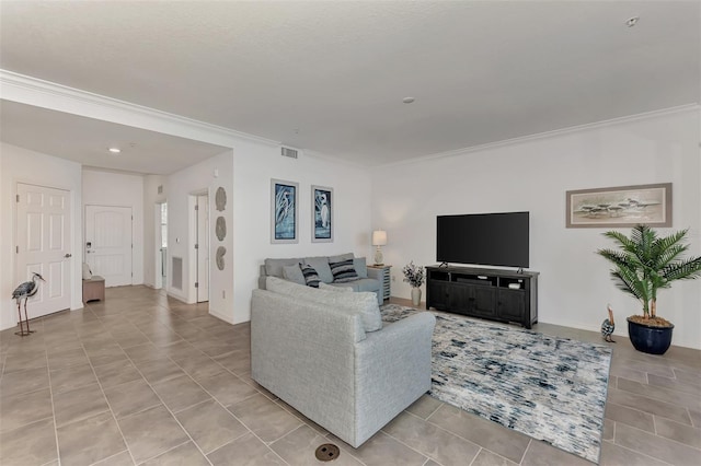 tiled living room featuring ornamental molding