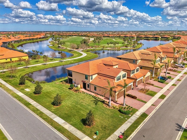 drone / aerial view with a water view