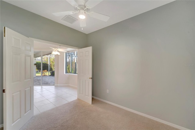 carpeted empty room with ceiling fan