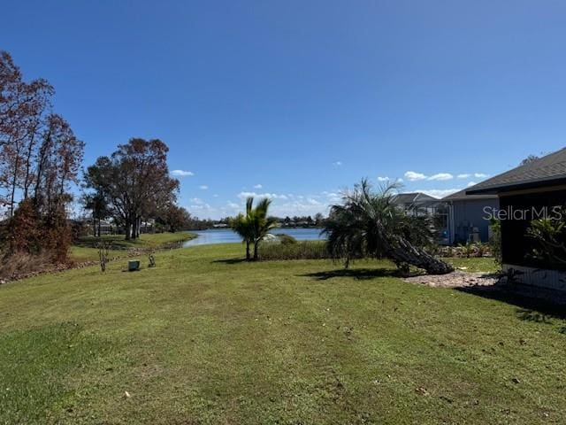 view of yard with a water view