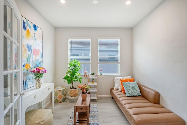 sitting room with light wood-type flooring