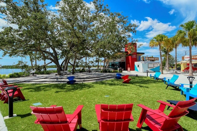 view of jungle gym featuring a lawn