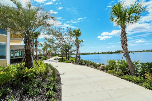 view of community with a water view