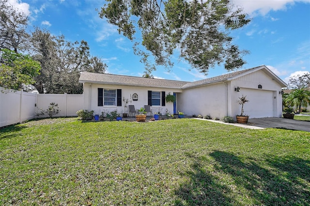 ranch-style home featuring stucco siding, driveway, fence, a front yard, and a garage