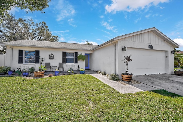 single story home with stucco siding, an attached garage, driveway, and a front yard