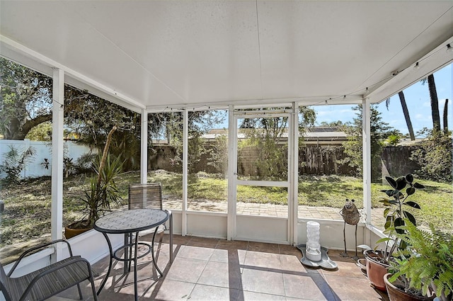 sunroom featuring a healthy amount of sunlight