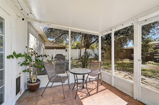 sunroom with plenty of natural light