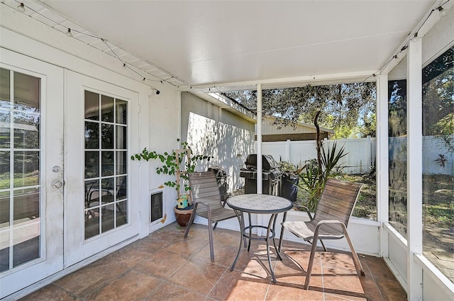 sunroom / solarium with french doors