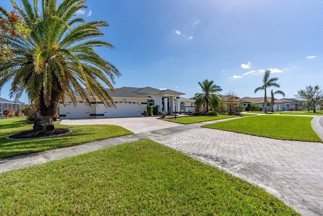 ranch-style house with a front yard and a garage