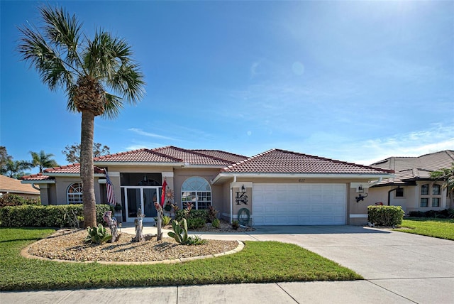 mediterranean / spanish-style house featuring a garage