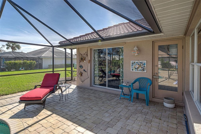 view of patio with a lanai