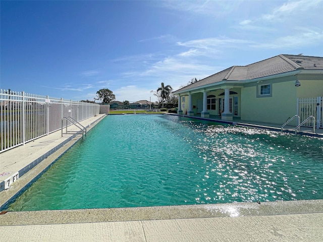 view of swimming pool featuring a patio