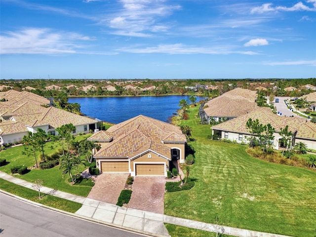 drone / aerial view with a water view