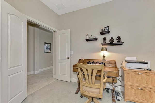 home office featuring light colored carpet